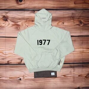 Essentials Light Gray Hoodie with '1977' Print
